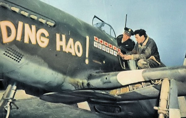 Lieutenant Colonel James H. Howard adds another victory mark to his P-51B-5-NA Mustang, 43-6315, DING HAO! (U.S. Air Force)