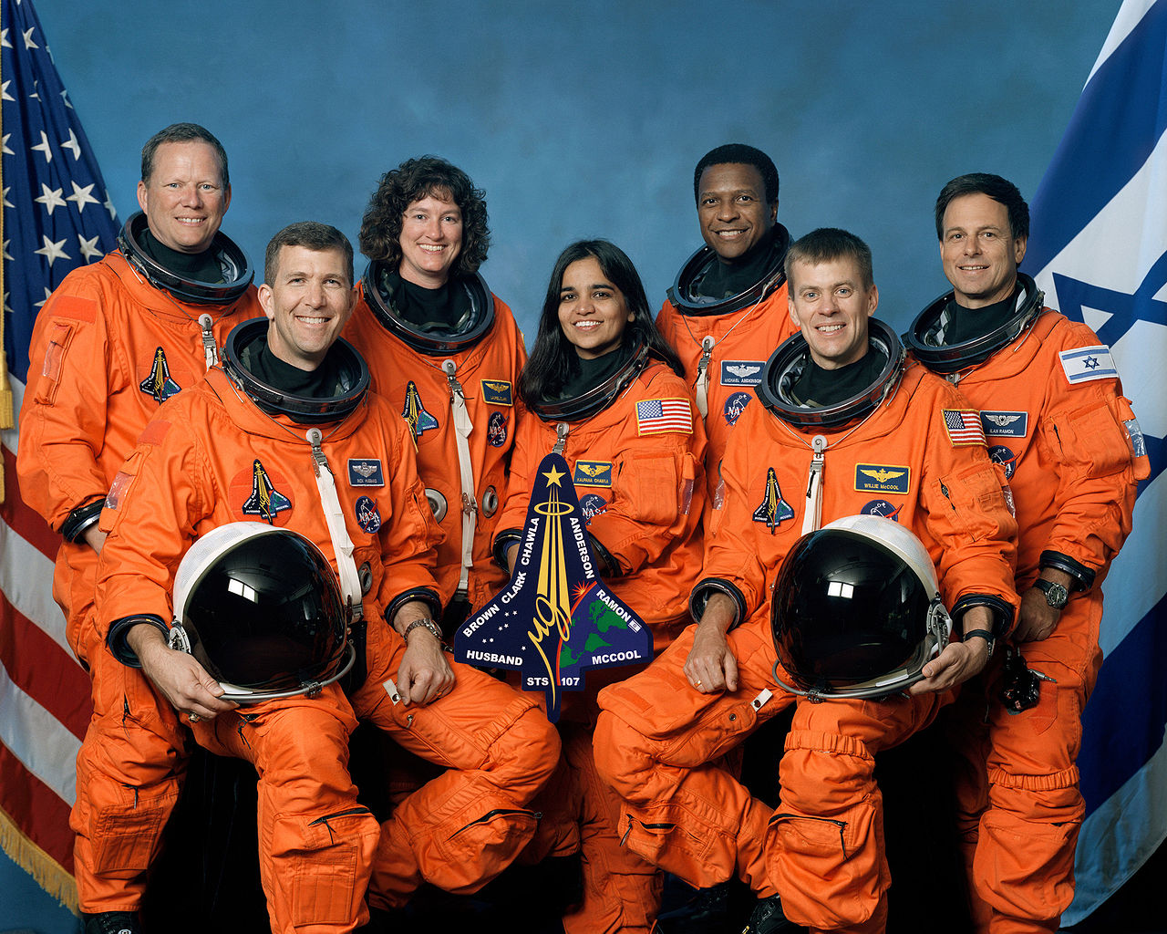 Front, left to right: COL Richard D. Husband, USAF, Kalpana Chawla, CDR William C. McCool, USN. Back, left to right: CAPT David M. Brown, MD, USN, CAPT Laurel Clark, MD, USN, LCOL Michael P. Anderson, USAF, COL Ilan Ramon, IAF. (NASA)