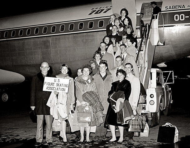 The United States Figure Skating Association team, boarding SABENA Flight SN548 at Idlewild Airport, New York, 14 February 1961. From left in front row are: Deane McMinn, Laurence Rochon Owen, Steffi Westerfeld and Rhode Lee Michelson. From left on the bottom: Douglas Ramsay, Gregory Kelley, Bradley Lord, Maribel Y. Owen, Dudley Richards, William Hickox, Ray Hadley Jr., Laurie Hickox, Larry Pierce, Ila Ray Hadley, Roger Campbell, Diane Sherbloom, Dona Lee Carrier, and Robert and Patricia Dineen. (U.S.F.S.A.)