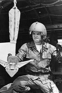 Airman 2nd Class Duane D. Hackney, USAF, with jungle penetrator, aboard a Sikorsky HH-3E Jolly Green Giant, Southeast Asia, 1967 (U.S. Air Force)