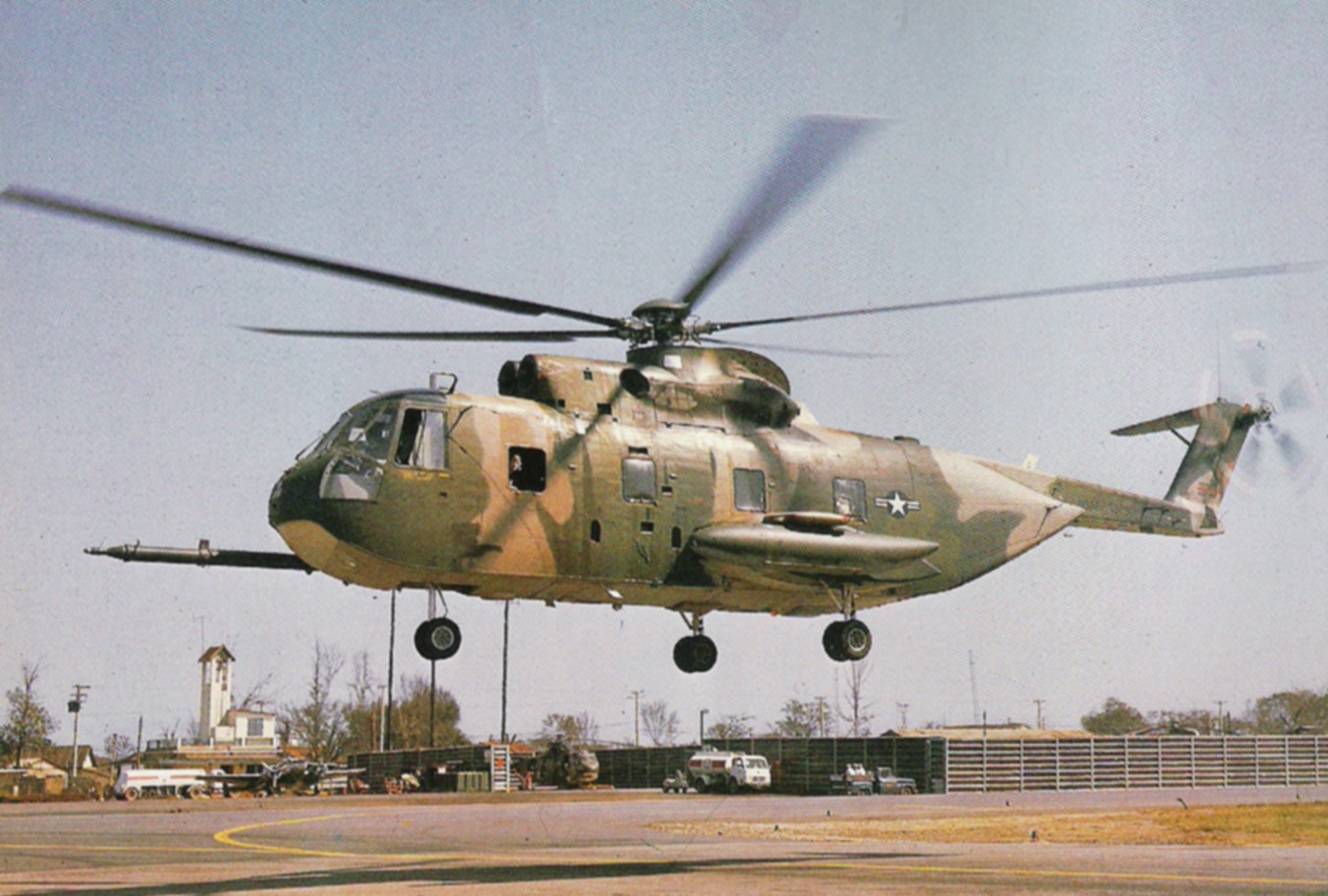 A Sikorsky HH-3E Jolly Green Giant (66-13290) ot the 37th ARRS, hovering in ground effect at Da Nang, 1968. (U.S. Air Force)