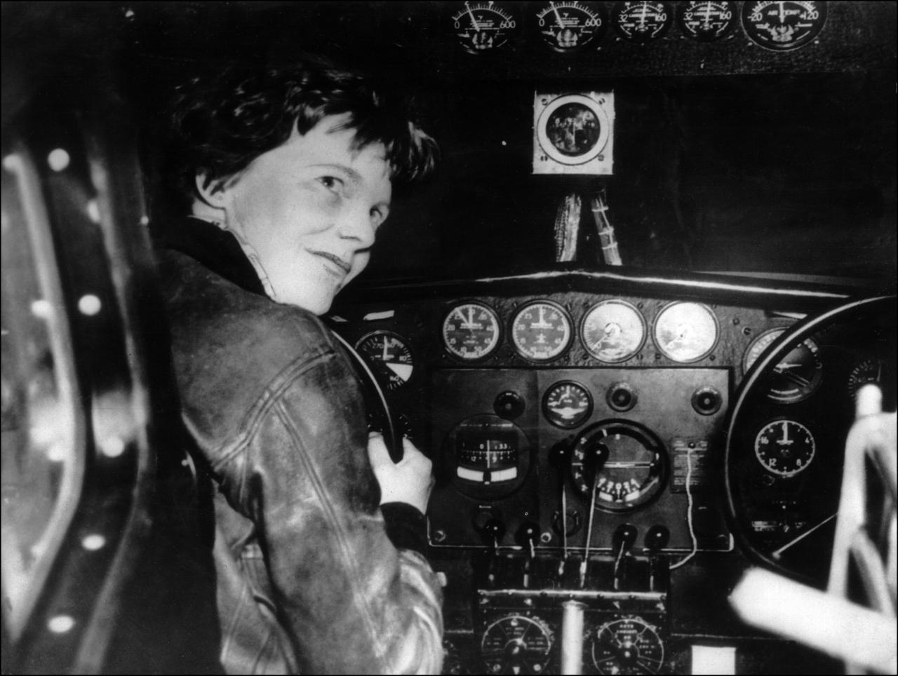 Amelia Earhart in the cocpit of her Lockheed Electra 10E, NR16020.