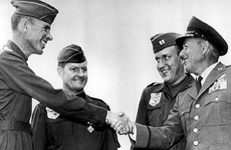General Thomas Power, Chief of Staff, Strategic Air Command, congratulates Captain Rober G. Swoers and his crew after Operation Heat Rise. 