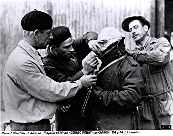 Renato Donati prepares for high altitude flight, 11 April 1934. (Caproni)