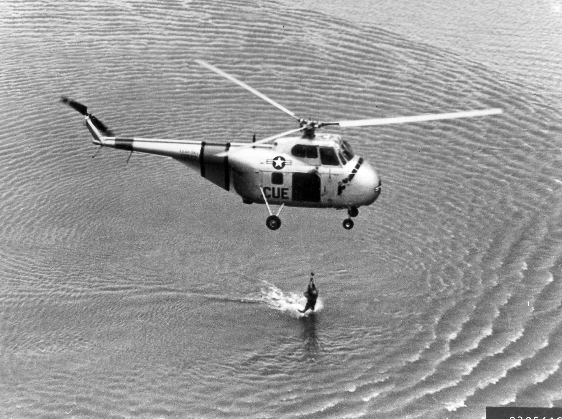 3rd ARG SH-19B hoists CAPT Joseph C. McConnell, Jr., USAF, from waters of the Yellow Sea, 12 April 1953. (U.S. Air Force)