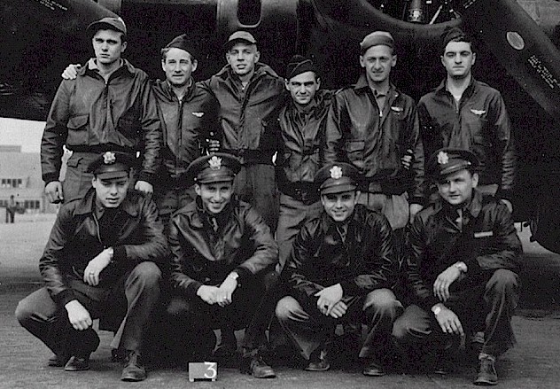 Lieutenant Michael with the crew of his Boeing B-17G Flying Fortress, 1943. Standing, left to right: SSGT Arthur Kosino, waist gunner; SSGT Pat Malone, tail gunner; SSGT Ray Ridge, flight engineer/top turret gunner; SSGT Anthony Russo, waist gunner; SSGT Fred Wilkins, ball turret gunner; SSGT Reynold Evans, radio operator/top gunner. Kneeling, left to right: 2LT Franklin Westberg, co-pilot; 2LT Sid Miller, navigator; 2LT John Lieber, bombardier; 1LT Edward S. Michael, pilot/aircraft commander. (U.S. Air Force)