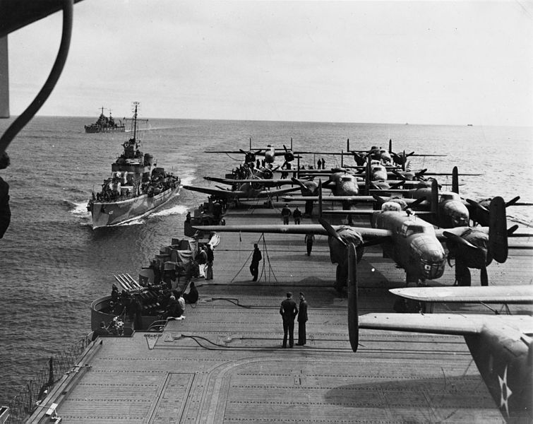 B-25 Mitchell bombers aboard USS Hornet (CV-8), with USS Gwin (DD-433) and USS Nashville (CL-43), somewhere in the Pacific, April 1942. (U.S. Navy)