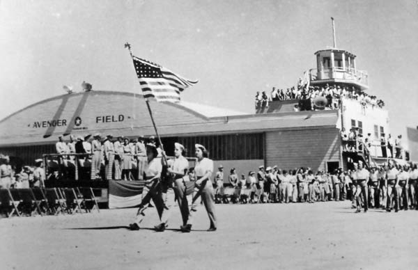 Graduating class of WASP Pilots pass in review.