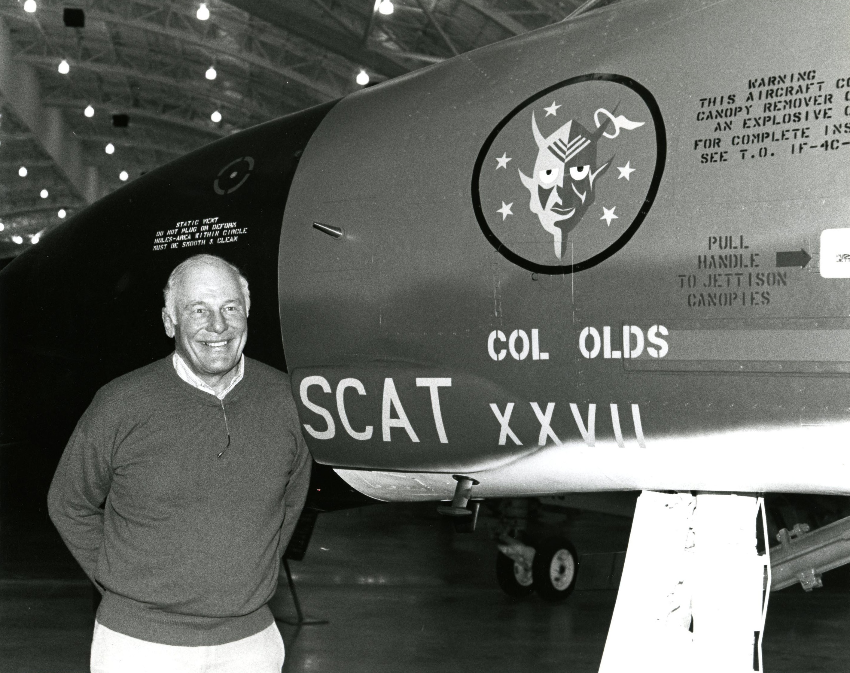Fighter pilot Brigadier General Robin Olds, U.S. Air Force (Retired) with SCAT XXVII at the National Museum of the United States Air Force. General Olds died 14 June 2007. (U.S. Air Force)