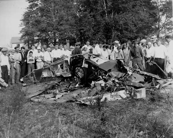 A crowd surrounds the wreckage of Jimmy Doolittle's Curtiss P-1C Hawk after it crashed during a demonstration at the 1929 Cleveland National Air Races. (Cleveland Press)