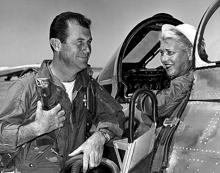 Jackie Cochran in cockpit of the Sabre Mk.3, with Major Charles E. Yeager, U.S. Air Force