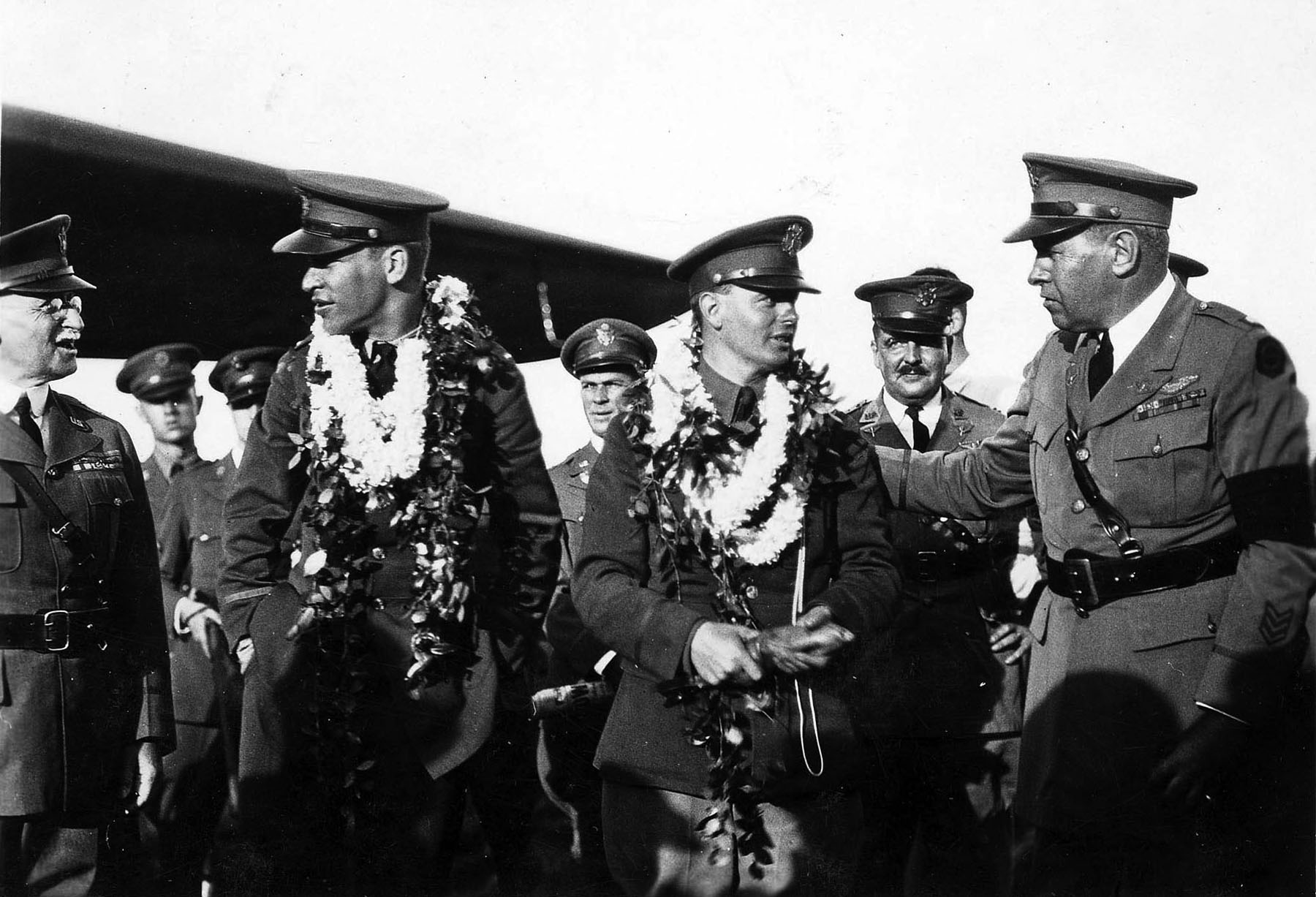 Lieutenants Lester Maitland and Albert F. Hegenberger ar congratulated on their transoceanic flight at Wheeler Field, Hawaii, 28 June 1927. (U.S. Air Force)
