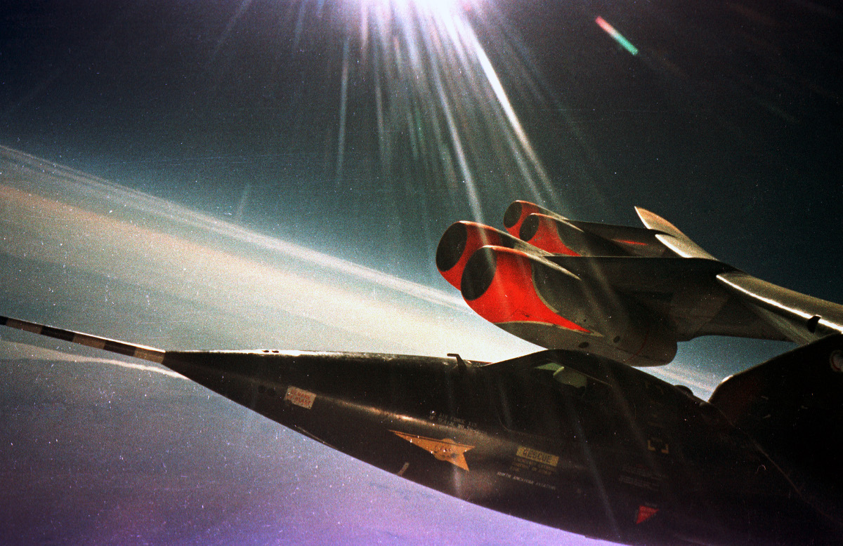 X-15A 56-6670 under the wing of NB-52A 52-003 at high altitude. Scott Crossfield is in the cockpit of the rocketplane. Air Force Flight Test Center History Office, U.S. Air Force)