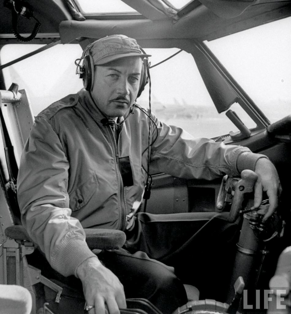Boeing test pilot Alvin M. "Tex" Johnston in the cockpit of of the 367–80. (LIFE) 