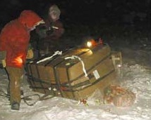 The first of six pallets of medical supplies airdropped by the U.S. Air force at Amundsen-Scott South Pole Station, 11 July 1999. (National Science Foundation)