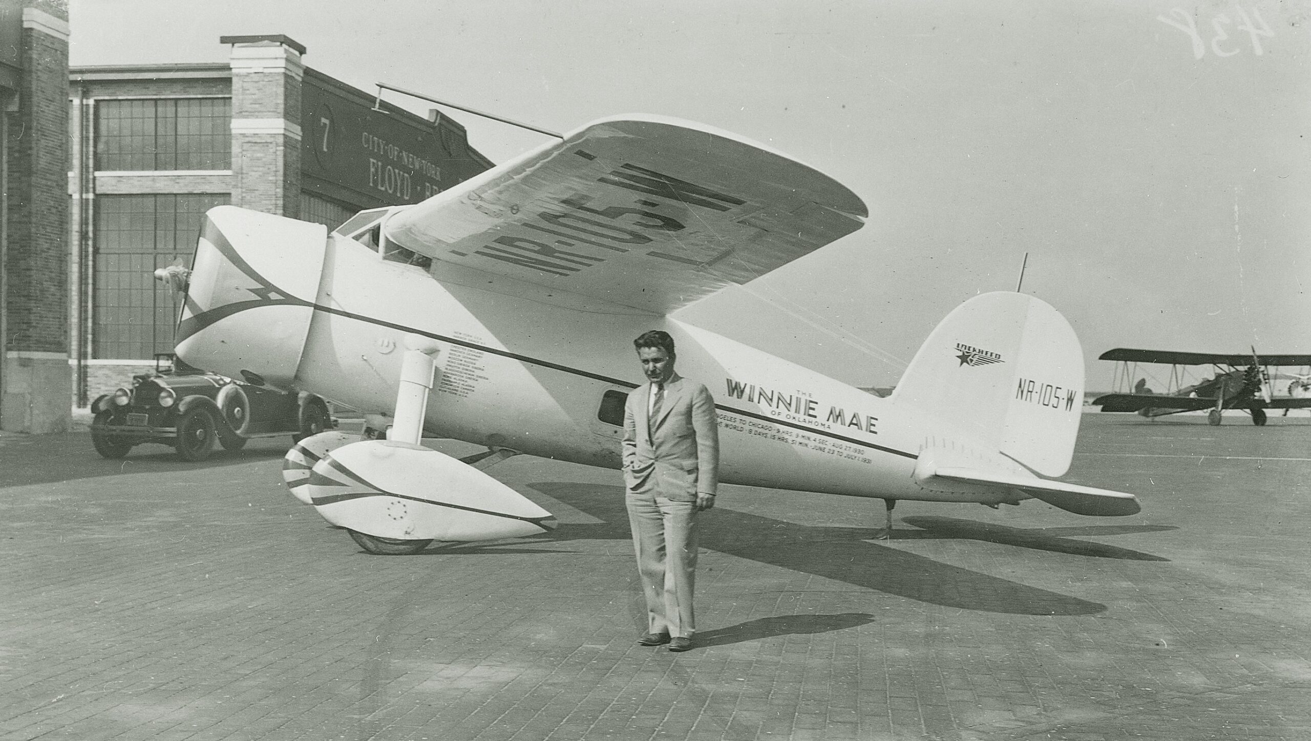 Wiley Post with his Lockheed Model 5C Vega, NR105W, at Floyd Bennet Field, Long Island, New York, 15 July 1933. (Rudy Arnold)