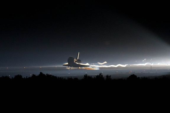 Atlantis touches down at the Shuttle Landing Facility, 0554 EDT, 21 July 2011. (NASA)