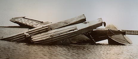 Wiley Post's hybrid airplane, NR12283, after the crash, 15 August 1935. (UPI)