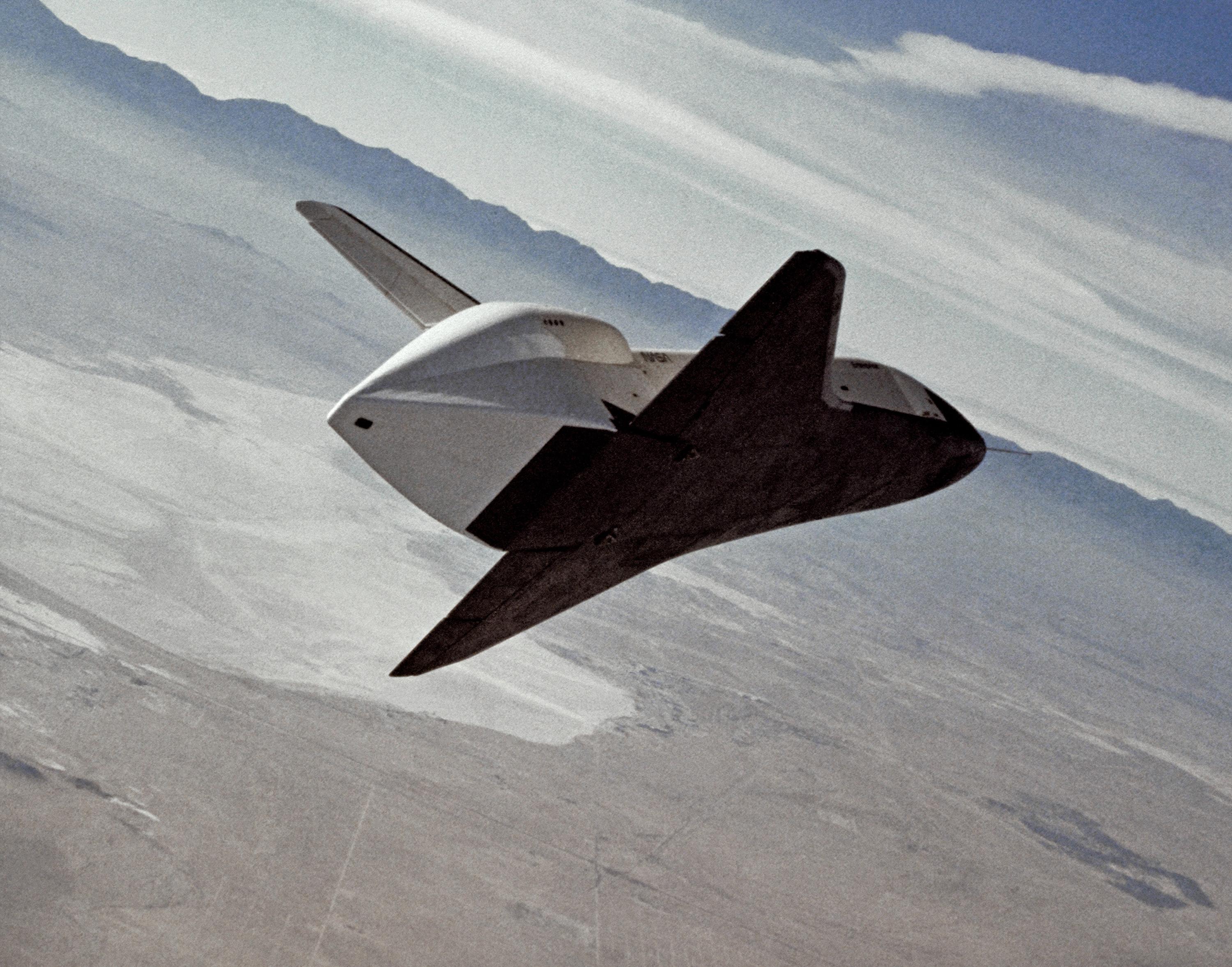 Space Shuttle Enterprise banks to the left to line up with the runway on Rogers Dry Lake. (NASA)