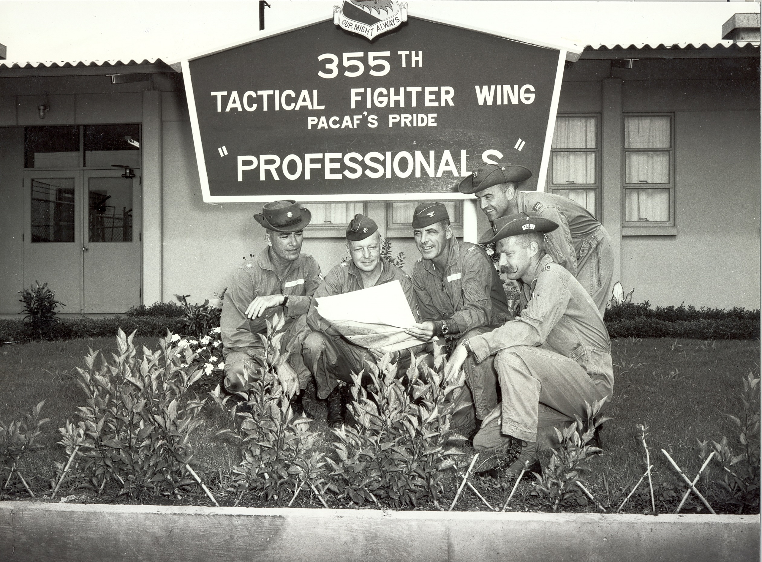 Colonel Robert M. White, United States Air Force, Deputy Commander for Operations, 355th Tactical Fighter Wing, Takhli RTAFB, 1967, with other Republic F-105 Thunderchief pilots. Colonel White is the third from the left. (U.S. Air Force)