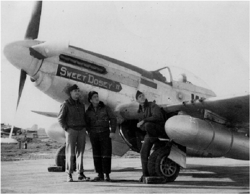 In this photograph, Lt. Robert M. White is on the right, with Lt. F. Mark Johnson (left) and Major Lee G. Mendenhall, all of the 354th Fighter Squadron, 355th Fighter Group. (Little Friends)