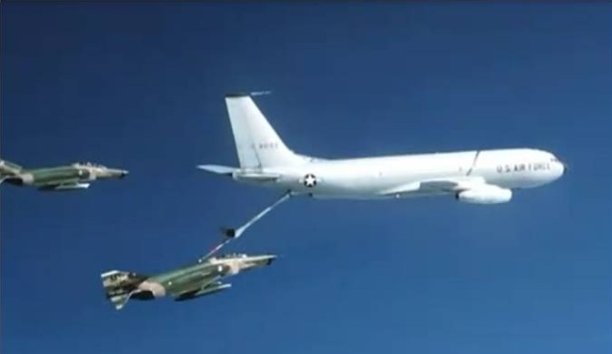 Captain Robert J. Goodman's Boeing KC-135A Stratotanker refuels and tows a crippled McDonnell Douglas F-4E Phantom II over the North Atlantic. (U.S. Air Force)