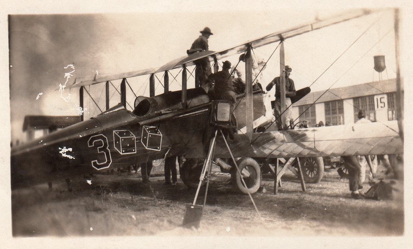 Lieutenant Doolittle's DH-4B-S-1 is serviced by maintenance technicians at Kelly Field, Texas.