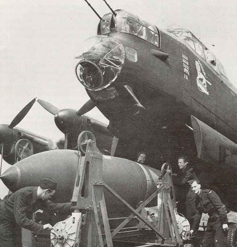 A Royal Air Force Avro Lancaster being "bombed up" with a 12,000 pound Tallboy earth-penetrating bomb.