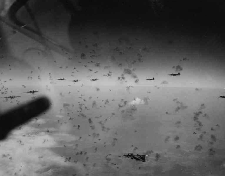B-17 Flying Fortress bombers under anti-aircraft artillery fire over Merseberg, Germany. (U.S. Air Force)