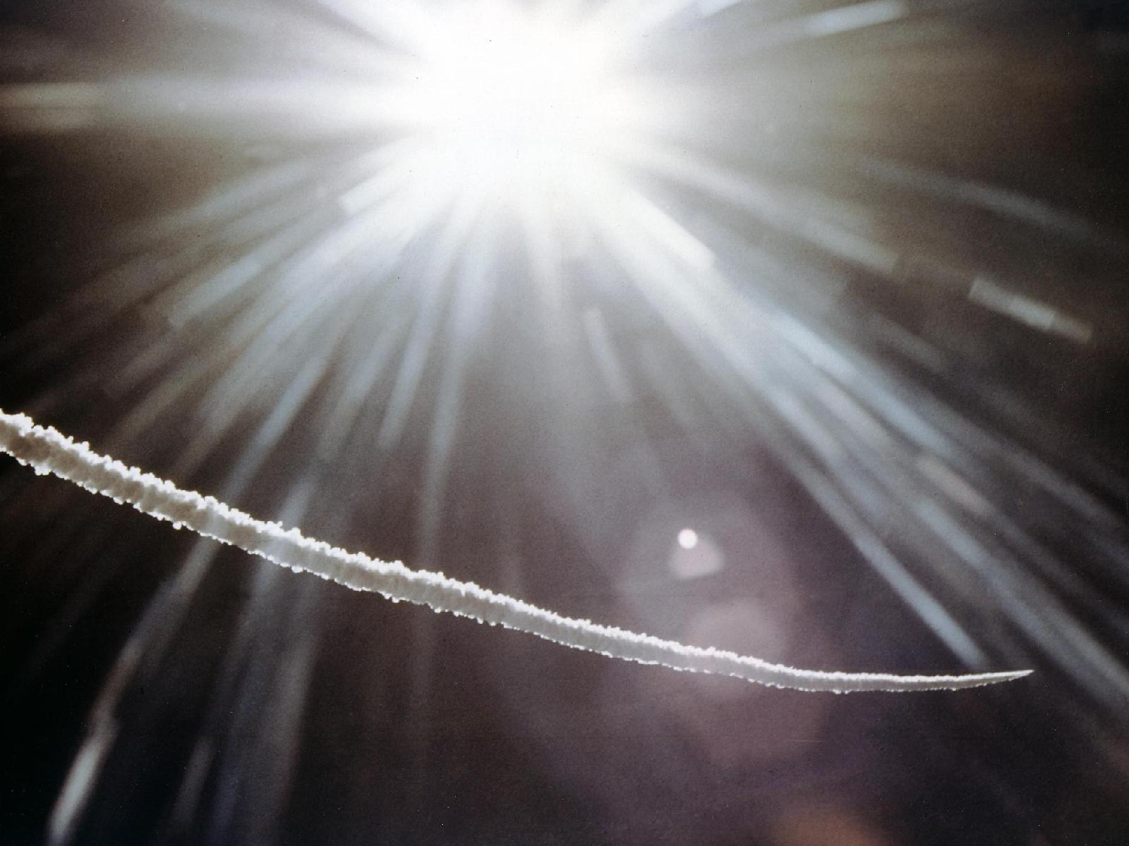 A North American Aviation X-15 hypersonic research rocketplane leaves a contrail as it climbs toward the edge of space. (NASA)