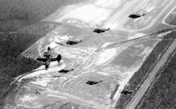 A C-130 Combat Talon leads the assault group during training at Duke Field, near Eglin Air Force Base, Florida, October–November 1970. (U.S. Air Force)
