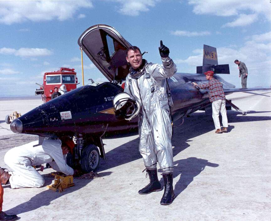Major Robert M. White, U.S. Air Force, with a North American Aviation X-15 on Rogers Dry Lake, 1961. (NASA)