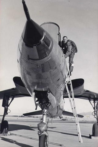 Brigadier General Joseph H. Moore with a Republic F-105 Thunderchief.