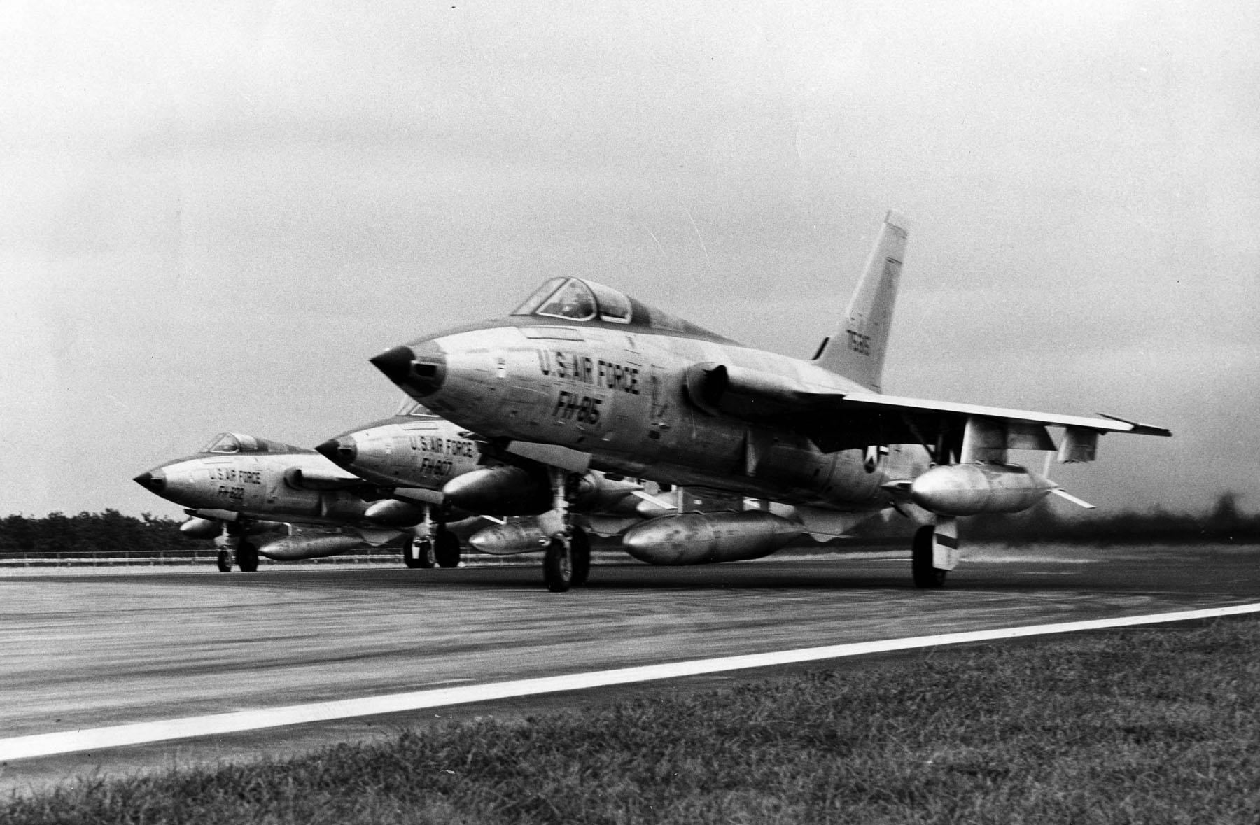 Three Republic F-105B-20-RE Thunderchiefs, serial numbers 57-5815, 57-5807 and 57-5822, begin their takeoff roll. This is the same block number as the F-105B flown by General Moore for the FAI World Speed Record. (U.S. Air Force)