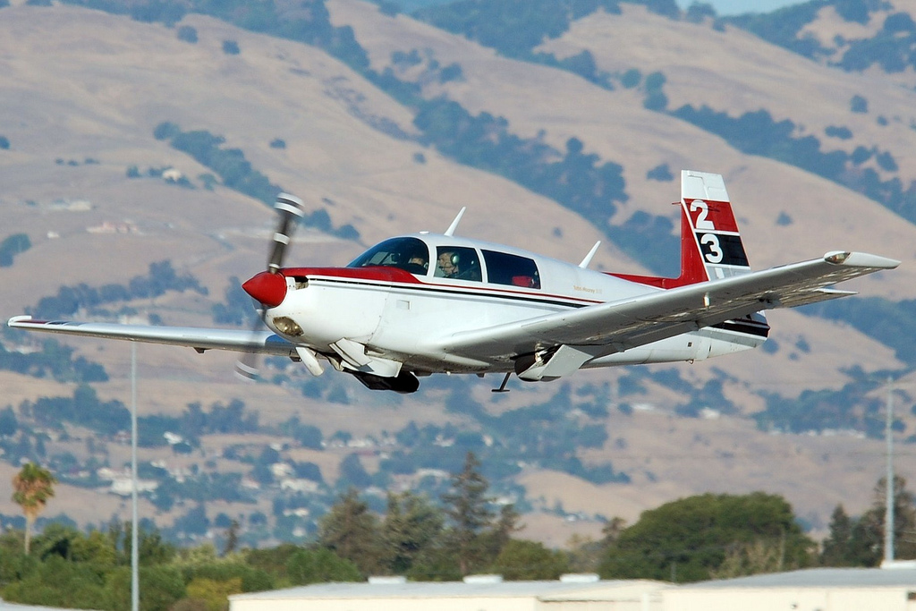 A Mooney M20K, similar to the one flown by Alan Gerharter from San Francsico to Washinto, D.C., taking off at San Jose, California. The landing gear is retracting. (Rich Snyder — Jetarazzi Photography) 