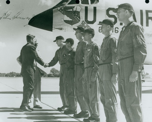 President John F. Kennedy congratulates the crew of 60-0040. This photograph shows the crew and President Kennedy with a different airplane, B-52G 57-6486. (U.S. Air Force)