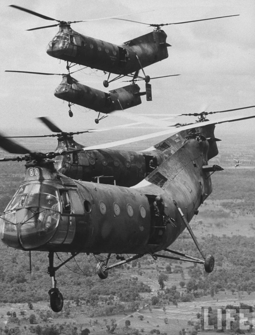 A flight of U.S. Army CH-21C Shawnee helicopters over South Vietnam, 1962. (LIFE Magazine)