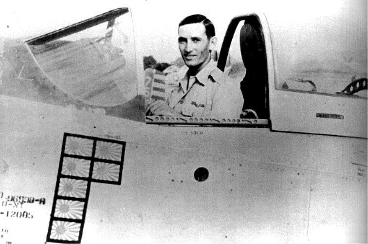 Captain George A. Davis, Jr., USAAF, in the cockpit of his North American Aviation P-51K-10-NT Mustang, 44-12085, during World War II.