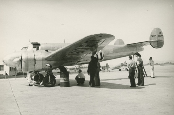 Checking weight and balance and fuel quantity calibration at Lockheed, Burbank, California. (Purdue) 