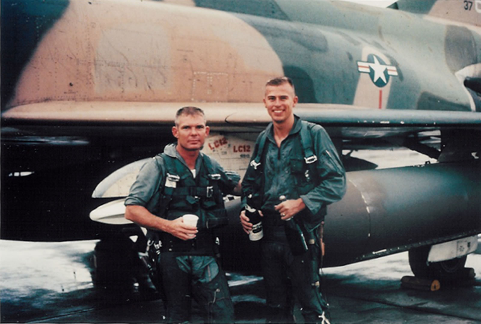 Captain John R. Pardo and 1st Lieutenant Stephen A. Wayne, after Wayne's 100th combat mission. (U.S. Air Force)