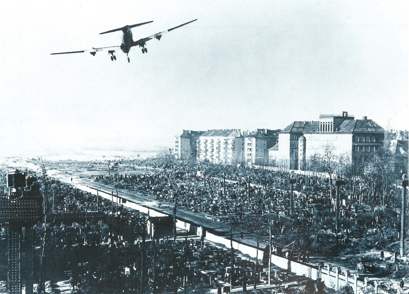 A Douglas C-54 Skymaster on final approach to Flughafen Berlin-Tempelhof. 