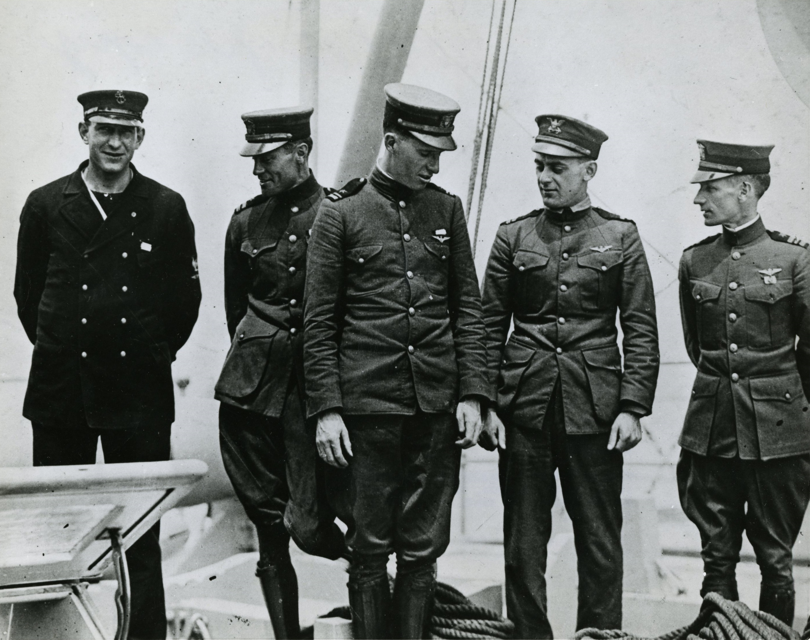 The flight crew of NC-4. Left to right: Chief Machinist Mate Eugene S. Rhoads, USN; Lieutenant James L. Breese, USN; Lieutenant (j.g.) Walter T. Hinton, USN; Lieutenant Elmer F. Stone, USCG; Lieutenant Commander Albert Cushing Read, USN. Ensign Herbert C. Rodd is not in this photograph. (U.S. Navy) 