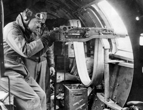 Captain Clark Gable manning a .50-caliber Browing machine gun in the waist of a B-17 bomber. (U.S. Air Force)