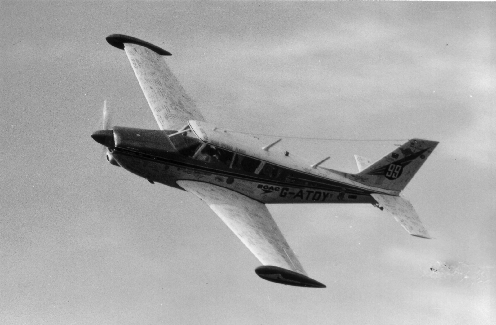 Sheila Scott's Piper PA-24-260B Comanche, G-ATOY, Myth II, after her around the world flight. The signatures on the wings and fuselage were collected at stops along the way.