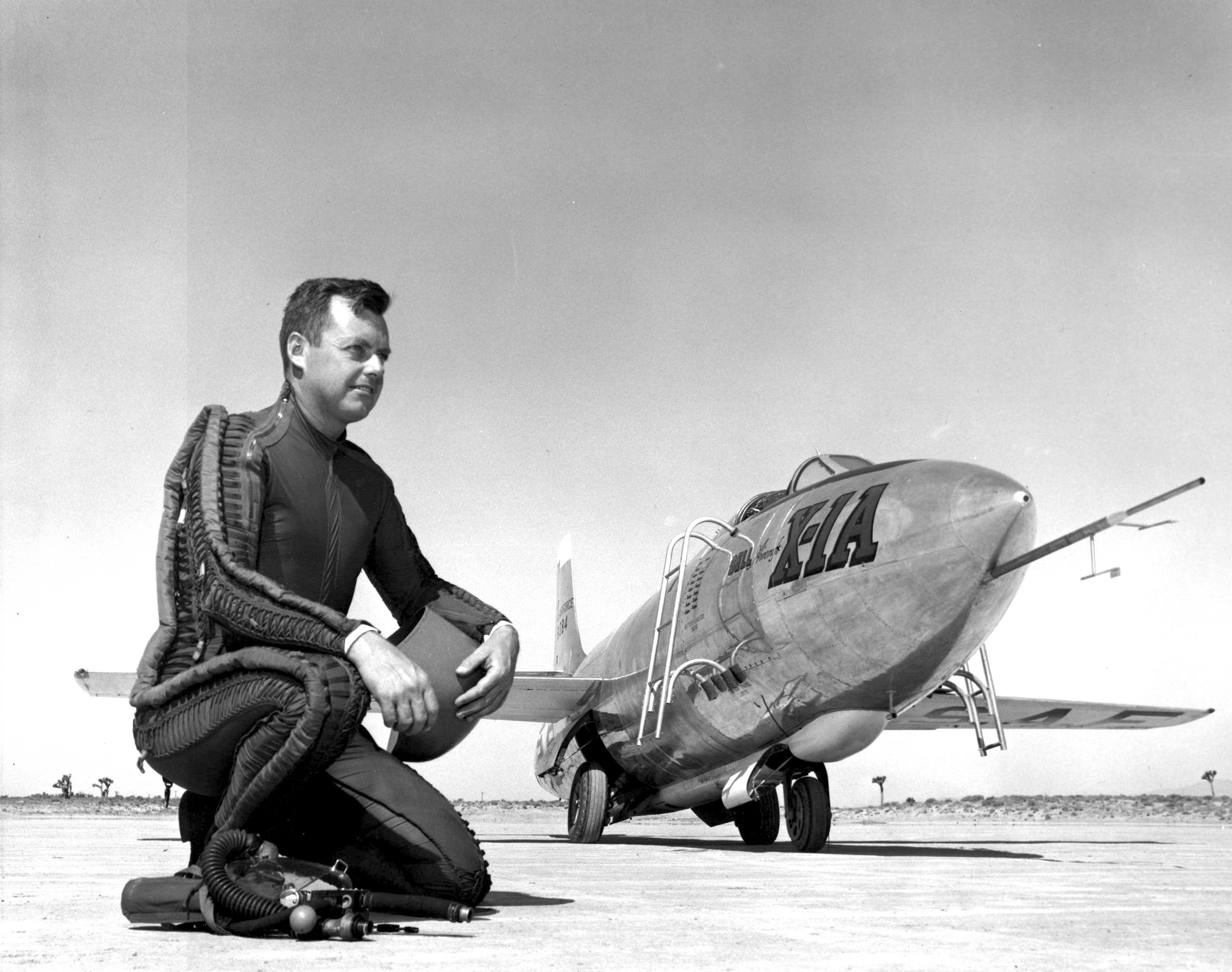 Major Arthur Warren "Kit" Murray, U.S. Air Force, with the Bell X-1A at Edwards AFB, 20 July 1954. Major Murray is wearing a David Clark Co. T-1 capstan-type partial-pressure suit with a K-1 helmet. (NASA)