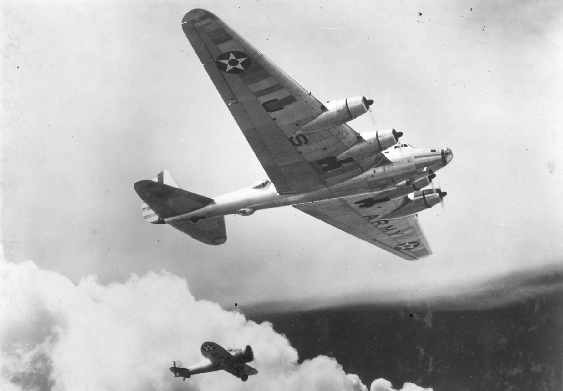 The Boeing XB-15 experimental long-range heavy bomber flies in formation with a Boeing YP-29 pursuit. (U.S. Air Force)