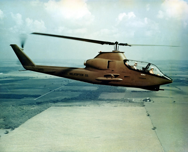 Bell Model 209 prototype, N209J, in flight with skids retracted. (Bell Helicopter Co.)