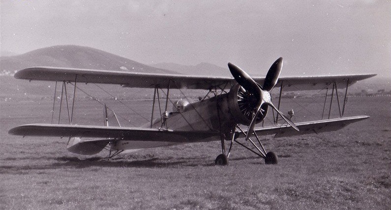 The Caproni Ca.161bis, with Lieutenant Colonel Mario Pezzi, wearing a full-pressure suit, in the cockpit. (Mario Pezzi Family Archive)