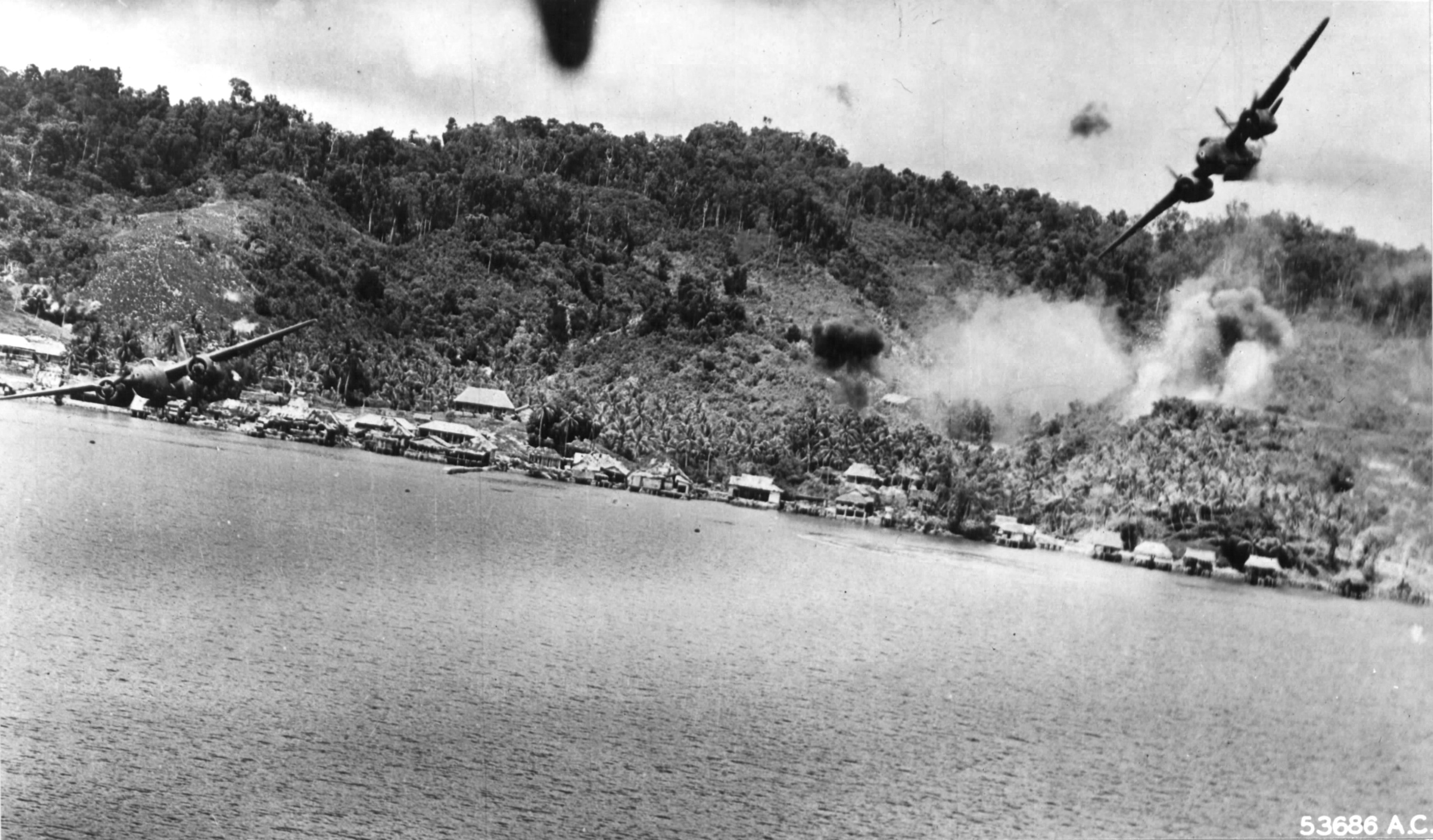 1. Bevo, a Douglas A-20G Havoc, at the upper right, has been hit by anti-aircraft gunfire and banks right. (U.S. Air Force)
