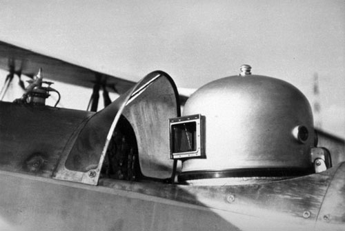 Lieutenant Colonel Mario Pezzi, wearing a full-pressure suit, seated in the cockpit of the Caproni Ca.161bis.